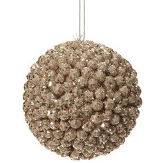 a ball ornament hanging from a string on a white background with lots of beads