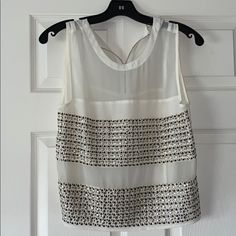 Super Chic And Fun Sleeveless Top With Sequin Like Detail. In Brand New Like Condition. It Is Semi Sheer On The Fabric Part Without The Sequins. Runs A Bit Over Sized. Chic Sequined Summer Vest, Chic Sleeveless Sequined Tank Top, White Sleeveless Blouse Camisole For Party, Chic Sleeveless Vest With Sequins, Chic Sleeveless Sequin Vest, Sleeveless White Blouse For Night Out, White Sleeveless Blouse For Night Out, Elegant Sequined Sleeveless Tank Top, Rose Cream