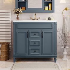 a bathroom vanity with blue cabinets and drawers