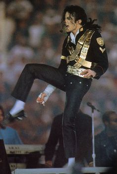 michael jackson performing on stage at a concert