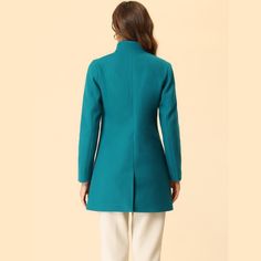 This long overcoat featuring a stand collar and single-breasted design adds a feminine and elegant feel to your winter look. The coat is spun from soft fabric and fully lined, which is comfortable for all-day wear with big slant pockets. A unique stand collar makes this regular outerwear more beautiful. It's a good choice for winter and cold fall. No matter what look you slip it over, this winter coat adds a layer of warmth and finishes the refined, warm, and effortless day-to-night look. Solid Stand Collar Blazer For Winter, Winter Solid Stand Collar Blazer, Winter Stand Collar Solid Blazer, Formal Solid Stand Collar Outerwear, Solid Stand Collar Outerwear For Formal Occasions, Formal Solid Outerwear With Stand Collar, Chic Winter Blazer With Stand Collar, Chic Stand Collar Pea Coat For Spring, Solid Color Single Breasted Outerwear With Stand Collar