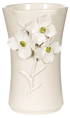 a white vase with flowers painted on it