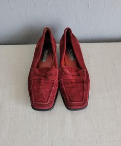 Add a touch of retro elegance to your wardrobe with these Vintage Suede Leather Loafers in Wine Red by Hobbs. These slip-on shoes feature detailed stitching and a chic square toe, complemented by a low heel for comfortable wear. The red leather lining and insole enhance the luxurious feel. Perfect for both casual and dressy occasions, these loafers combine timeless style with modern comfort. Brand: Hobbs Condition: USED. Some stains and scratches. Repaired. Size: EU 37 (labeled), US 6.5 Measurem Slip On Shoes For Women, Red Retro, Vintage Suede, Leather Loafers, Wine Red, Loafers For Women, On Shoes, Low Heels, Timeless Style