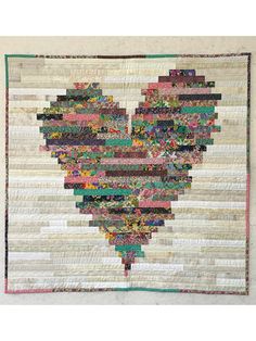 a heart quilt is featured on the cover of a book, have a heart quilt pattern