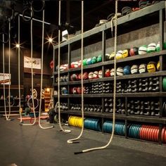 there are many different colored ropes in the gym