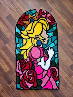 a door mat with an image of a princess on it