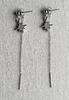 The star charm is real platinum plated with real cubic zirconia gems embedded! I've been so excited to share this one, it's one of my absolute favorite earrings! This is not an exact replica, it is simply an inspired endeavor to show my appreciation for BTS's taste in accessories. I use stainless steel posts and hypoallergenic chains and findings. I'm very careful to source my materials from trusted suppliers, in order to provide high quality and affordable earrings. The earring is quite light a Silver Star-shaped Cubic Zirconia Earrings, Star-shaped Cubic Zirconia Earrings With Star Charm, Bts Earrings, Kpop Earrings, Single Earring, Star Charms, The Star, Bts Jimin, So Excited