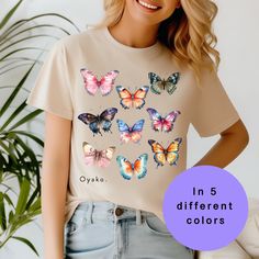 The Butterfly Shirt is a colorful moth T-shirt designed for adults and available in unisex sizing. This vintage-style T-shirt is perfect for animal lovers and makes a unique birthday gift for her. Featuring a beautiful monarch butterfly design, it is also an ideal gift for mom. Welcome to Oyako Designs! At Oyako Design, where inspiration stems from family and is tailored for you, we blend sophistication with unique style. Our specialty lies in crafting premium shirts that combine comfort, durabi Multicolor Graphic Tee T-shirt As Gift, Fun Multicolor T-shirt As A Gift, Fun Multicolor T-shirt For Gift, Summer T-shirt With Sublimation Print For Gift, Multicolor Graphic Tee T-shirt For Gift, Multicolor Sublimation Print T-shirt As Gift, Cute Butterfly Print Crew Neck T-shirt, Multicolor T-shirt With Funny Print As Gift, Summer T-shirt With Sublimation Print As Gift