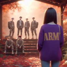 a woman standing in front of a group of soldiers wearing purple sweaters with the words army on them