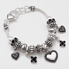 Style No : [264006] Mbb06450-As-Jet-1"H Color : Silver Burnished Theme : Heart Marcasite Heart Full Charm Bead Bracelet Size : 1" H, 7 1/2" + 1/2" L Heart Clasp Closure Elegant Silver Beaded Bracelets With Heart Charm, Elegant Silver Beaded Bracelet With Heart Charm, Silver Metal Heart Bracelet With Charms, Valentine's Day Silver Beaded Crystal Bracelet, Valentine's Day Beaded Metal Jewelry, Elegant Silver Charm Bracelet With Heart Beads, Silver Beaded Crystal Bracelet For Valentine's Day, Silver Heart Beads Charm Bracelet For Valentine's Day, Silver Charm Bracelet With Heart Beads For Valentine's Day