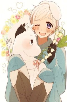 a person hugging a horse with flowers on it