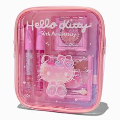 This makeup set is perfect for Hello Kitty® super fans! Featuring two lippies, an eyeshadow palette, and cheek color, this is a must-have for your very own.Makeup Set by Hello Kitty®Claire's Exclusive Flavor: Vanilla, CherryPack Size: 4Included: 2 lip glosses, 1 eyeshadow quad, 1 cheek color, 1 caseMaterial: Liquid, cream - Hello Kitty® 50th Anniversary Claire's Exclusive Makeup Set - 4 Pack Hello Kitty And Friends Makeup, Lip Gloss Hello Kitty, Hello Kitty Lipgloss, Hello Kitty Cute Stuff, Hello Kitty Everything, Hello Kitty Stuff Accessories, Hello Kitty Makeup Products, Hello Kitty Things To Buy, Kawaii Makeup Products