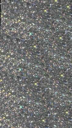 an image of some very pretty glitters on the ground in black and silver colors