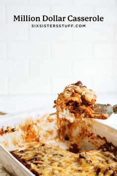 a casserole dish is being lifted with a spatula from the casserole