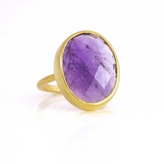 This beautiful bezel set ring is made with large oval faceted natural Purple Amethyst in 18K Vermeil Gold. The ring has a 925 stamp. Gemstone size is approximately 15 x 20 mm. Please specify your size at checkout. Since I use natural gemstones, the stones may vary slightly in color, shape and size. Due to the nature of this stone there are natural inclusions and small internal cracks. This ring is available in three finishes: ✦ 18K VERMEIL GOLD ✦ BRIGHT STERLING SILVER Please leave me a note at February Birthstone Ring, Purple Amethyst Ring, Gold Vermeil Jewelry, Bezel Set Ring, Bezel Ring, Oval Rings, Set Ring, Amethyst Jewelry, Birthstone Bracelets