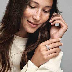 Pay tribute to natural beauty when you wear the Sparkling Asymmetrical Herbarium Cluster Ring. In a reflection of the organic symmetry of nature, this sterling silver ring features an asymmetrical band and flower motif. Three marquise-shaped stones and two pear-shaped stones create clusters surrounding round stones. One band is half-covered in pavé, while a second polished half-band creates another layer of depth and dimension. Unique and intricate, this organic-inspired ring will be a showstopp Avengers Infinity Stones, Timeless Rings, Infinity Band Ring, Triple Spiral, Infinity Rings, Pear Halo, Pandora Blue, Infinity Band, Wishbone Ring