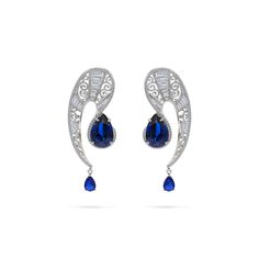 The QUEEN Earrings, inspired by the ancient Mongolian queens and their iconic coiffure, were created as a testament to the enduring strength of women and as an ode to the majestic essence of queenship for the modern woman. Luxury Blue Chandelier Earrings For Formal Occasions, Luxury Blue Diamond Drop Earrings, Blue Single Earring For Evening, Luxury Blue Earrings For Evening Wear, Luxury Blue Earrings For Evening, Luxury Blue Pierced Earrings, Elegant Blue Pierced Chandelier Earrings, Globe Gift, Queen Earrings