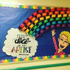 a bulletin board with an image of a woman holding a rainbow