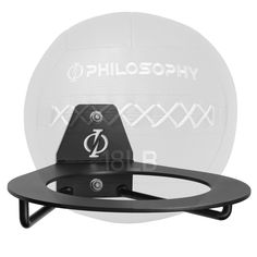 a white volleyball sitting on top of a black rack with the word philosohy