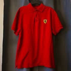 Red Ferrari Polo Tee Never Worn Like Brand New Soft Material No Stains Size Medium Red Fitted Short Sleeve Polo Shirt, Classic Red Fitted T-shirt, Fitted Red Polo Shirt With Polo Collar, Red Fitted Polo Collar T-shirt, Red Fitted Polo Shirt, Fitted Red Polo Shirt, Classic Fitted Red T-shirt, Classic Red Polo Collar Top, Red Fitted Cotton Polo Shirt