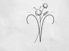 a black and white drawing of flowers on a sheet of paper with the word love written in it