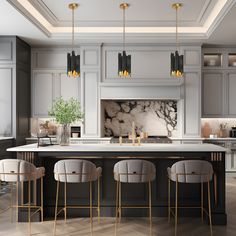 a kitchen with marble counter tops and gold bar stools in front of an island