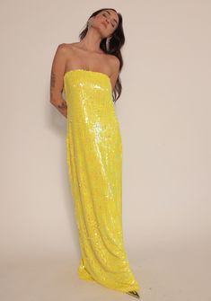 Tube Maxi Dress, Lined Wear this gorgeous dress with the tie in the back, front, or tie it around your neck for a halter look! Knit stretch sequin with Tie Closure Model wearing size XS Illusion Dress Formal, Bright Summer Dresses Classy, Sequin Dress Maxi, Maxi Sequin Dress, Yellow Glitter Dress, Yellow Sequin Dress, Yellow Party Dress, Black Tie Gowns, Organza Fashion