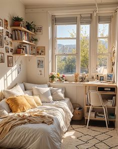 a bed sitting in a bedroom next to a window filled with lots of books and pictures