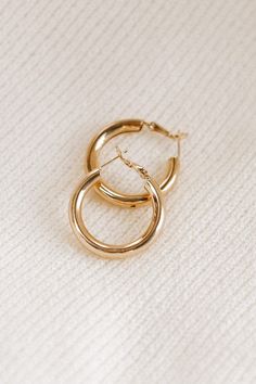 Classic Metal Hoop Earrings, Classic Metal Circle Hoop Earrings, Classic Metal Hoop Earrings For Everyday, Classic Round Metal Hoop Earrings, Classic Gold-tone Gold-plated Hoop Earrings, Minimalist Circle Hoop Earrings For Formal Events, Minimalist Circle Hoop Earrings For Formal Occasions, Minimalist Gold-tone Hoop Earrings For Formal Occasions, Everyday Gold-tone Hoop Earrings