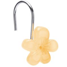 a yellow flower shaped glass hook with a metal bar in the middle and two petals attached to it