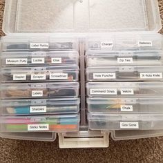 a plastic box filled with lots of different types of items and labels on the lid