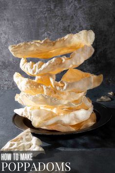 A pile of poppadoms on a plate against a grey background. Poppadoms Recipe, Fav Food