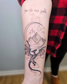 a woman with a tattoo on her arm that says, you do not yeld