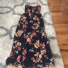 This Floral Dress Is Nwot Has 2 Slits In The Front Very Pretty Size Small Navy Blue Casual Maxi Dress With Floral Print And Split, Casual Split Midi Dress, Spring Midi Dress With Split For Date Night, Casual Maxi Dress With Side Slits, Casual Floral Print Maxi Dress For Date Night, Spring Split Midi Dress For Date Night, Casual Maxi Dress With Side Slits For Brunch, Casual Maxi Dress With Side Slits For Date Night, Blue Dresses With Side Slits For Day Out