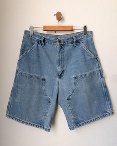 Vintage Carhartt Jorts Double Knee Jean Shorts 80s/ 90s era, made in usa, vintage Carhartt Double Knee faded and distressed jean shorts (jorts). Item is sold as is. Shorts are nicely worn with a sick wash, distressing is present as well as subtle paint splatter markings. Measurements Waist: 16.5 in Inseam: 9.25 in Leg Opening: 11.35 in Overall Length: 20 in Thigh: 13.85 in Open to offers. Feel free to ask any further questions. All items listed are cleaned and cared for so when you get it out th Cheap Vintage Dark Wash Shorts, Cheap Vintage Short Jeans, Vintage Relaxed Fit Jean Shorts With Pockets, Vintage Medium Wash Relaxed Fit Shorts, Vintage Cotton Jean Shorts For Streetwear, Vintage Jean Shorts With Pockets For Streetwear, Vintage Distressed Medium Wash Shorts, Vintage Light Wash Relaxed Fit Shorts, Vintage Faded Cotton Shorts