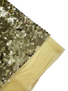 the sequins on the fabric are gold and silver, but it's hard to tell what color this material is