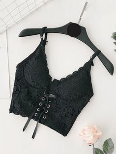 Style: SexyColor: Black.WhiteFabric Content: Polyester. ViscoseFit Type: Slim fitNeckline: V NeckSleeve Length: SleevelessDesign: Eyelet Lace-Up. Back Zipper. Adjustable Strap SIZE BUST (Inches) L 30.71-35.43 M 29.13-33.86 S 27.56-32.28 XL 32.28-37.01 Bodycon Floral Dress, Black And White Fabric, Lace Bustier, Eyelet Lace, Crop Top Blouse, Bustiers, Exclusive Fashion, Online Tops, White Fabric