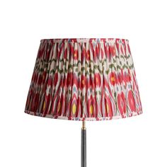 a lamp with a red and green pattern on it