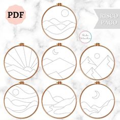 four embroidery hoops with different designs on them