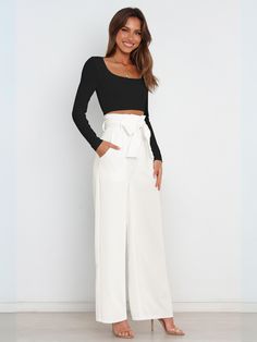 Add some flair to your wardrobe with our Iconic High Rise Pocketed Trouser Pants in classic white. Featuring a chic bow-tie belt, these pants are perfect for any stylish occasion. Stay comfortable all day long with the high rise fit and functional pockets. Upgrade your look with a touch of playful sophistication! Size Guide: Model is 5’6” tall, and has a 32.2” bust, 26.2” waist, & 34.8” hips. She is wearing a S / US 4 / AU 8. This pants is true to size. Material: 100% Polyester . Feature: Side Pockets. High rise. Straight leg. Front zip fly. Adjustable Bow-Tie Belt. Not Lined. Care Instructions: Machine wash / Cold hand wash Tie Length, Womens Tie, Waist Pants, Straight Pants, Trouser Pants, Green Fashion, Wide Leg Trousers, Womens Fashion Casual, Trousers Women