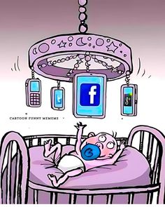 a baby laying in a crib under a mobile phone