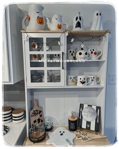 the shelves are decorated with halloween decorations