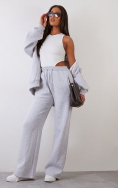 Add some comfy vibes to your new season wardrobe with these tall ash grey straight leg joggers. Made from an ash grey hue material with a straight leg fit, an elasticated waistband and drawstring detailing, what's not to love Team these joggers with a bodysuit, a matching hue hoodie, your go-to accessories and fresh kicks for a look that is perfect for those chilled off-duty days and beyond.   Length approx 91.5cm/36 (Based on a sample size S)   Model wears size S   Model Height - 5ft 10 Outfits With Joggers, Straight Leg Sweatpants Outfit, Straight Leg Joggers, Grey Tracksuit, Comfy Vibes, Rp Characters, Joggers Outfit, Chic Shirts, Chiffon Dress Long