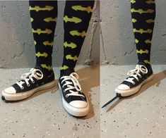 two pictures of someone wearing black and yellow batman socks with white laces on them