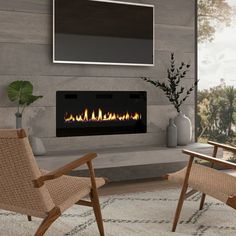 a living room with two chairs and a fireplace