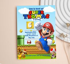 this is an image of a super mario birthday party with the name and age on it