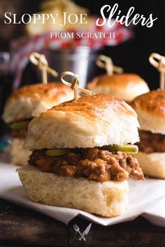 sloppy joe sliders from scratch on a napkin with toothpicks in the middle