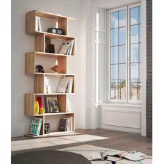 a bookshelf in the corner of a room with an open window behind it