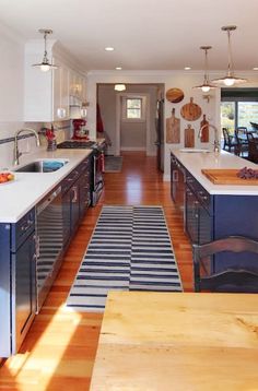 the kitchen is clean and ready to be used as a dining room or family room