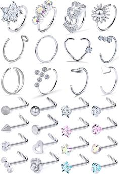 PRICES MAY VARY. [Package include]: 12pcs nose rings hoops septum ring hoop(helix cartilage earrings hoop, lip ring) + 16pcs nose studs staight nose piercing jewelry with different top with a velvet pouch; [Size]: Stainless steel Nose rings stud 18g (1.0mm); nose hoops inner diameter: 5/16"(8mm); nose rings studs 18g (1.0mm) * pole length: 7mm; L Shaped nose rings studs top jewelry and ball dia.: 2-3mm; 18g Nose rings hoop can be used as nose hoops, septum nose rings, and you can use them as car 18g Nose Ring, Nose Ring Sizes, Cute Nose Rings, Helix Earrings Hoop, Tragus Earrings Hoop, L Shaped Nose Ring, Nose Rings Studs, Nose Piercing Hoop, Tragus Hoop